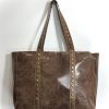 BOLSO DE PIEL TACHUELAS